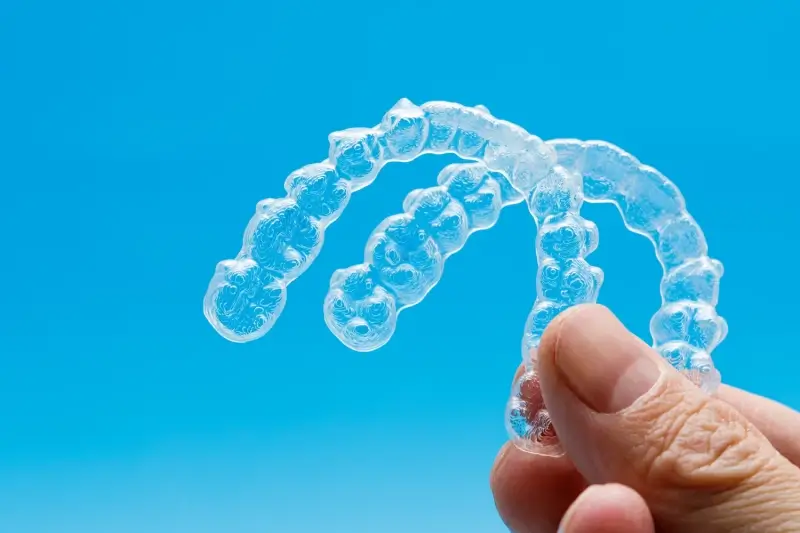 Czy leczenie Invisalign boli?